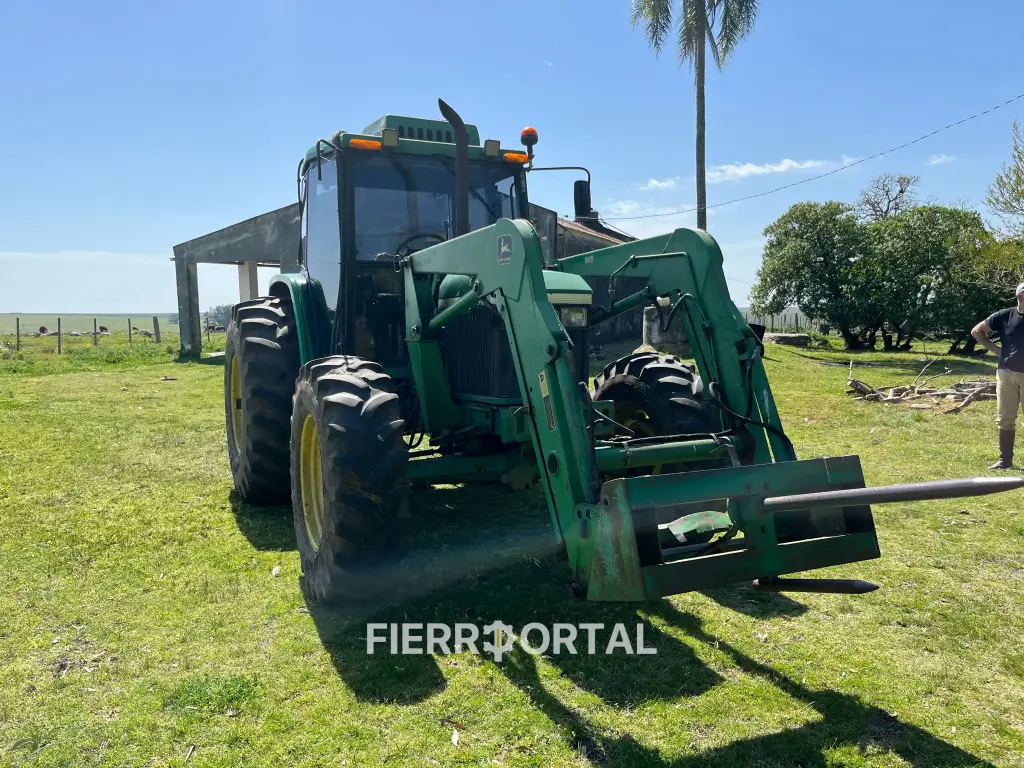 Tractor John Deere 6405 con pala